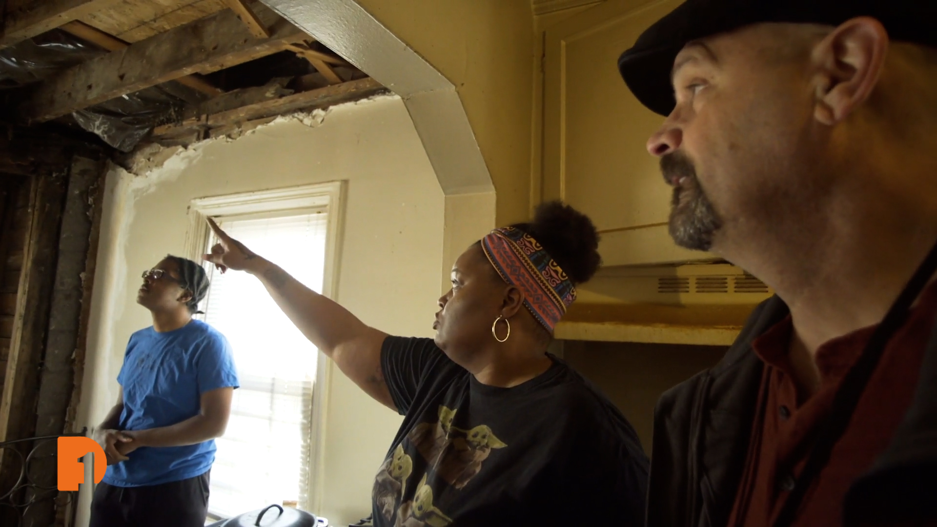 Detroit resident Semone Alexander and United Community Housing Coalition Repair Serviceman Tim Bishop